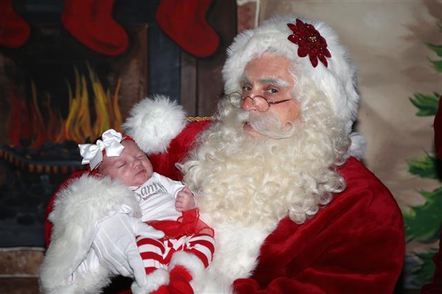 Baby's First Picture with Santa Claus