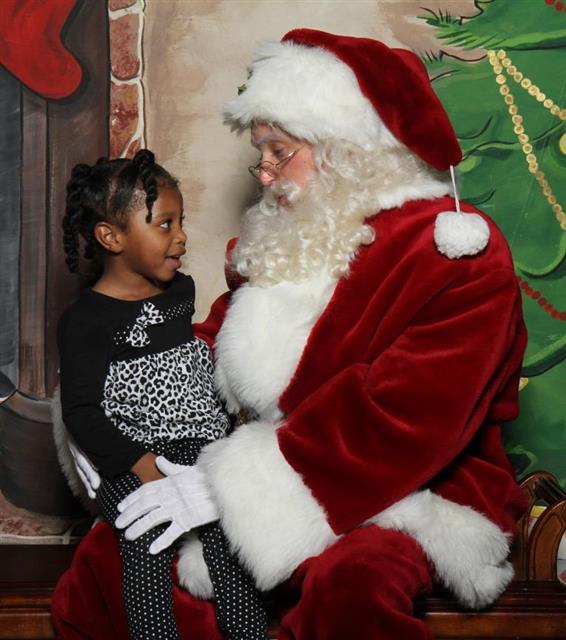 Real Bearded Santa Listening to Child