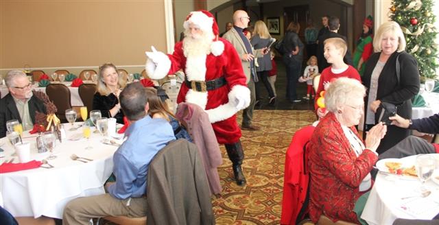 Professional Santa Claus greeting guests at Killeen Texas holiday event