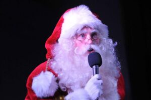 Professional Santa Claus speaking at Chicago stage event