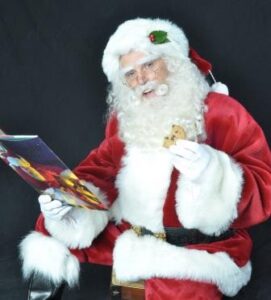 Santa Claus reading during Chicago family storytime visit